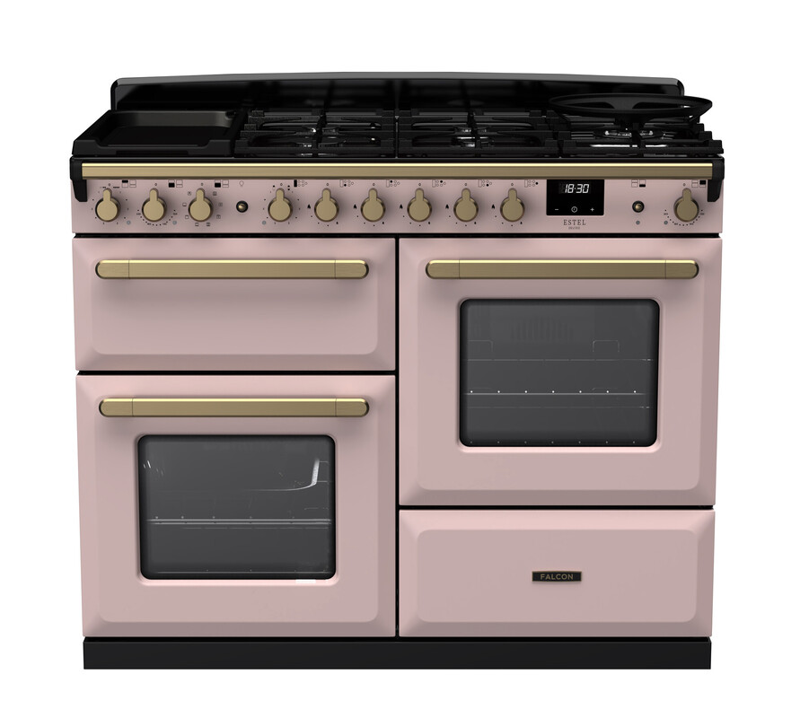 Großer rosa Standherd mit sechs Gasbrennern, drei Backöfen und goldfarbenen Griffen, ideal für große Küchen im Retro-Stil